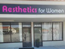 Aesthetics For Women's inviting Kansas City location at 620, featuring the clinic's signature pink and white signage. Conveniently situated in the KC metro area, this premier women's medical spa offers Missouri's most advanced beauty treatments in a priva