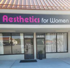 Aesthetics For Women's inviting Kansas City location at 620, featuring the clinic's signature pink and white signage. Conveniently situated in the KC metro area, this premier women's medical spa offers Missouri's most advanced beauty treatments in a priva